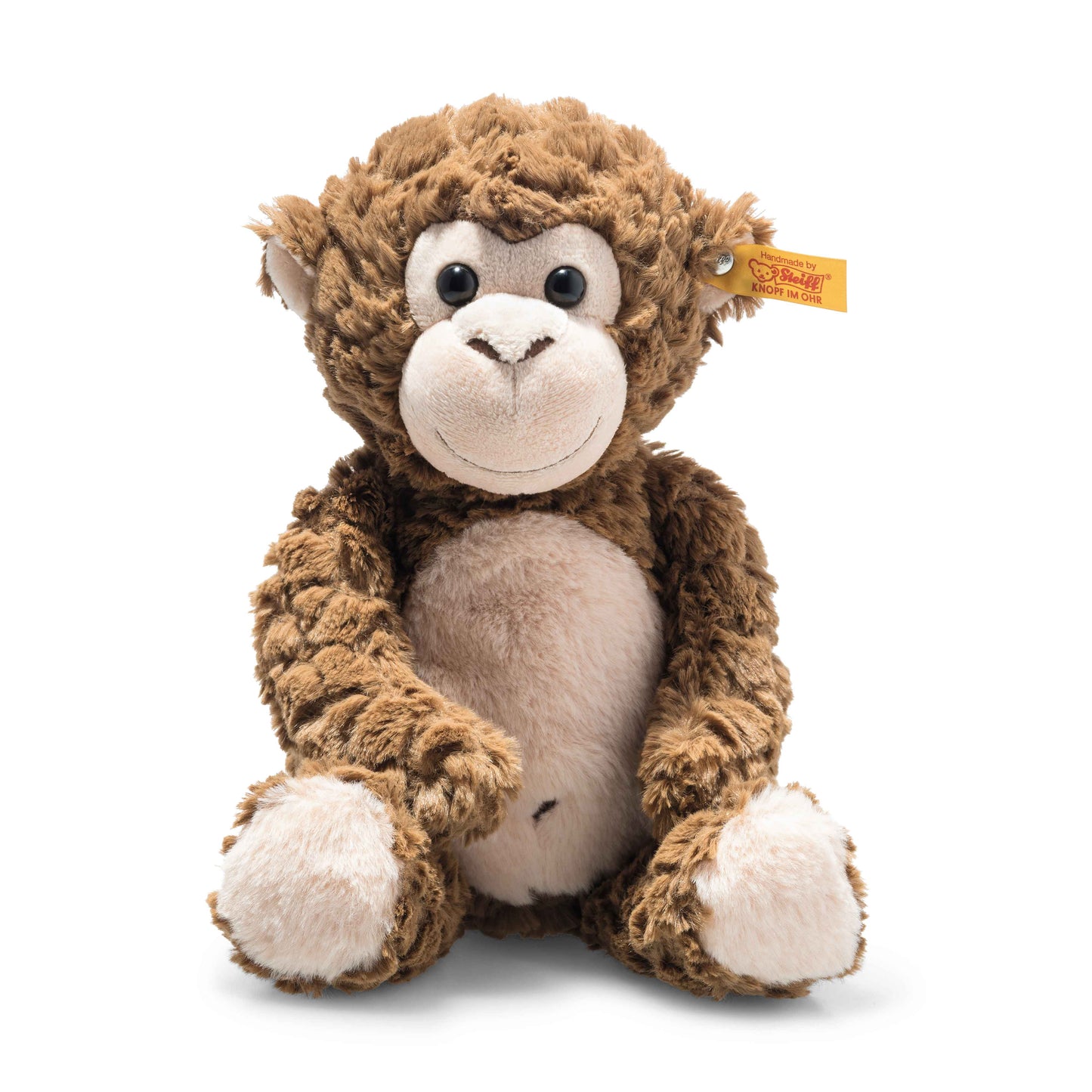 Plush monkey toy by Steiff with a visible brand tag on a white background