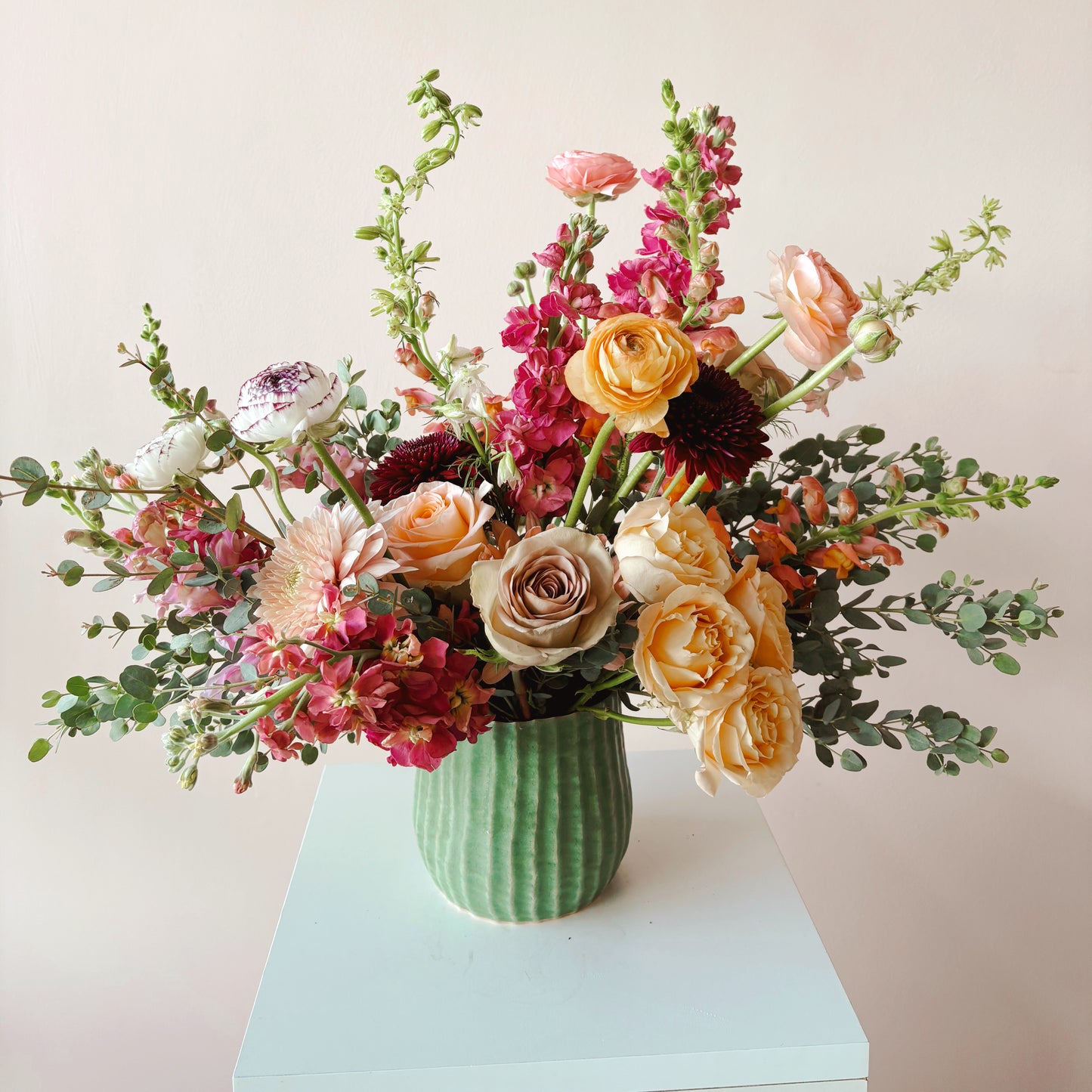 colorful flower arrangement in a green vase. Exclusive, high end flower arrangement - columbia, tennessee