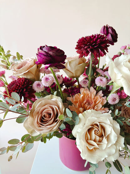 Close up image of flowers in an arrangement.