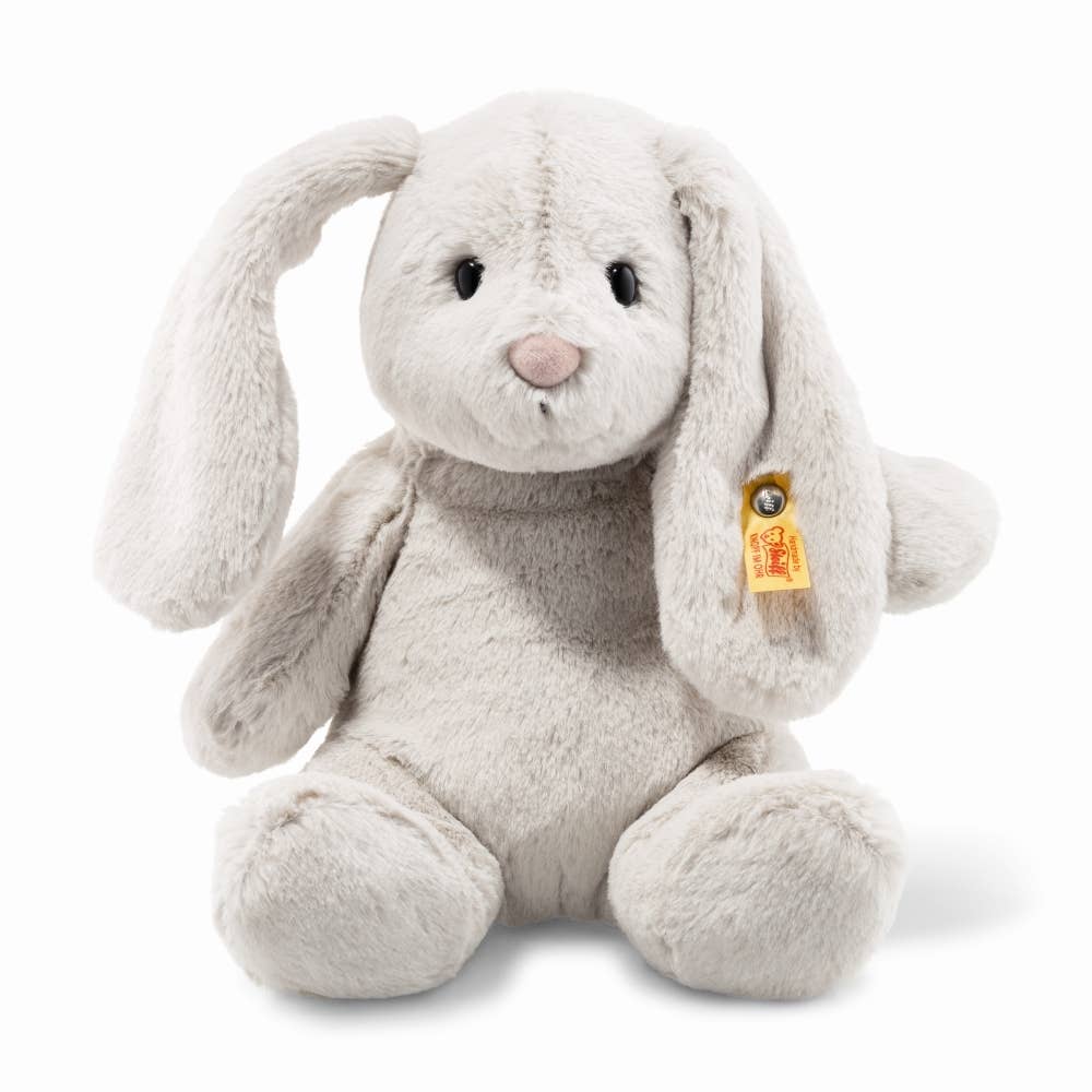 A gray plush Steiff Hoppie Bunny Rabbit with a tag in its ear.