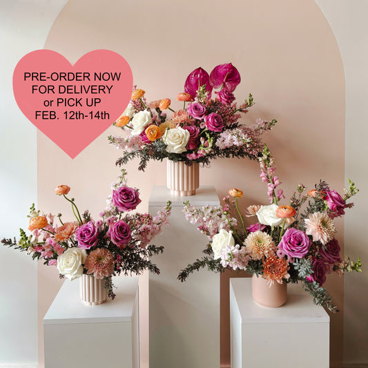 Three valentine's day arrangements by bloomstall flowers.  arrangement name is KISS, three different sizes are shown.