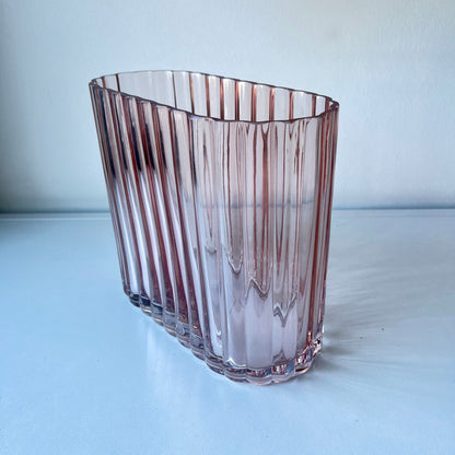 Blush color, heavy, ribbed art deco style vase.