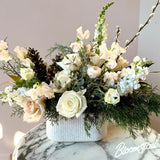 Winter Meadow holiday arrangement by Bloomstall Flower Boutique