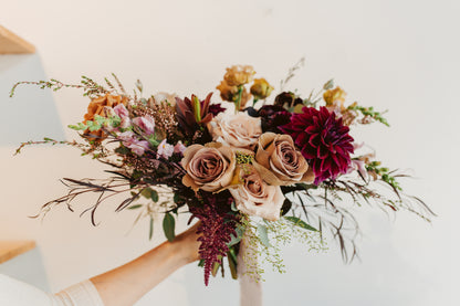 Moody wedding flower bouquet held by a woman - by Bloomstall - Columbia, Tennessee.