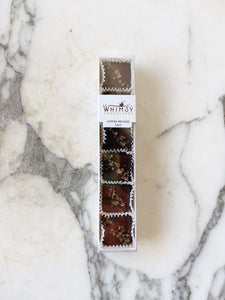 Chocolates by Whimsy available for delivery or pickup at Bloomstall Flowers.